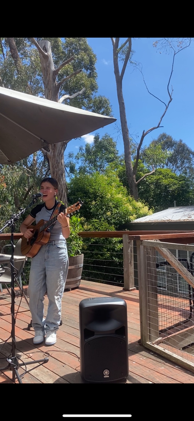 Ella singing outdoors